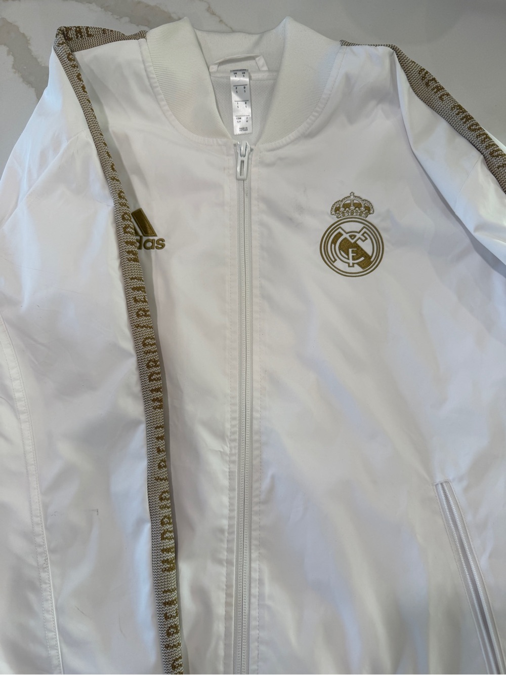 adidas White Jacket with Gold Real Madrid Crest